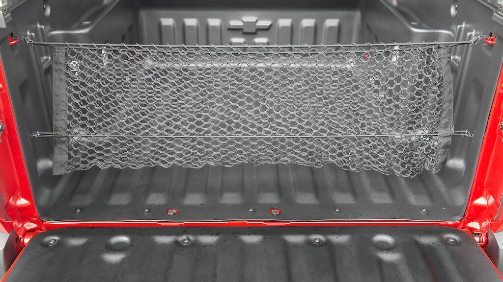 Organiza tu caja de carga con la red vertical para Chevrolet Montana 2025